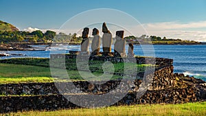 Ahu Tahai against ocean and Hanga Roa in Rapa Nui