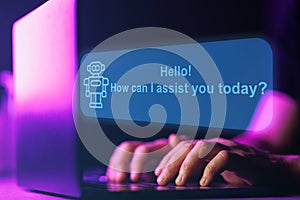 AI Chatbot assistant. Artificial intelligence robot chat with human. Close up shot of hands and laptop keyboard