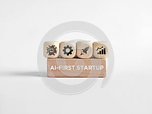 Ai-first startup concept with wooden cubes showing icons and text