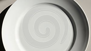AI-generated close-up of an empty white plate