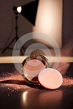 Golden Blush Compact With Powder Burst In Dramatic Studio Lighting Environment