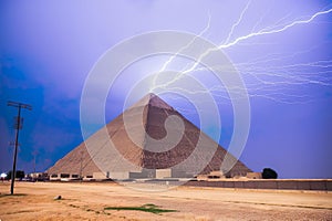 AI generated illustration of the Great Pyramid of Giza illuminated by a flash of lightning