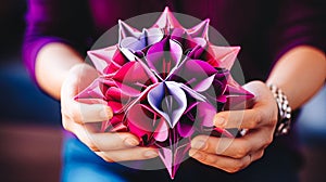 AI-generated illustration of hands holding an origami flower crafted from purple paper