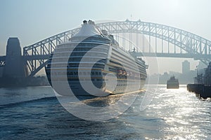 AI generated illustration of a massive white cruise ship gracefully gliding beneath a bridge