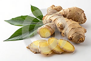 Fresh ginger root isolated on white surface