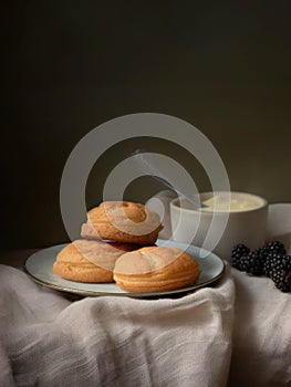 AI generated picture of shu buns, cream and berries close up