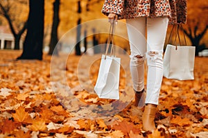 AI generated. Young woman holding paper shopping bag in autumn park in nature