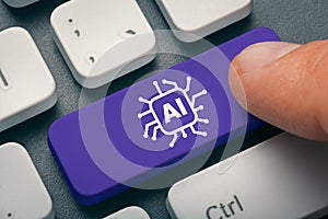 AI I Artificial Intelligence concept: Close up index finger pressing computer key with AI word and symbol. Visualization of machin