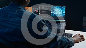 Artificial intelligence engineer working from home using notebook