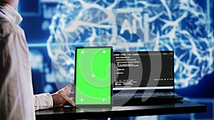 AI script coding on green screen tablet
