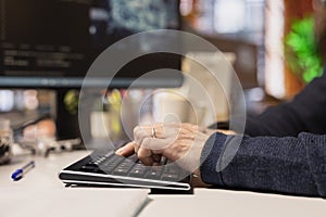 AI startup office software developer typing on computer keyboard, close up