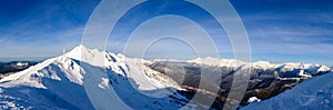 Aibga mountain peak covered by snow. Gorki Gorod ski resort. Sochi, Russia