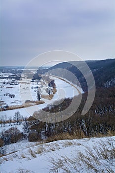 Aidar River in Ukraine.Winter.Forest, river and valley.Vertical