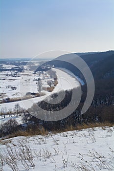 Aidar River in Ukraine.Winter.Forest and river.Vertical frame.
