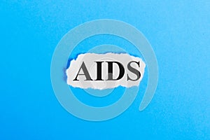 AIDS text on paper. Word AIDS on a piece of paper. Concept Image