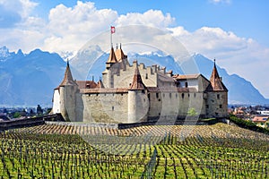 Aigle castle, swiss Alps mountains, Switzerland photo