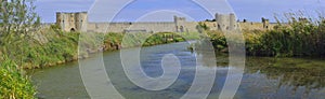 Aigues Mortes Castle and lake near by.