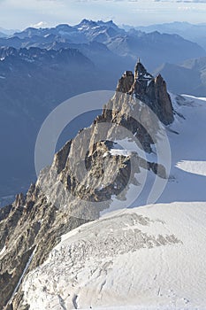 Aiguille du Midi from Mont-blanc du Tacul in the evening light in the French Alps, Chamonix Mont-Blanc, France
