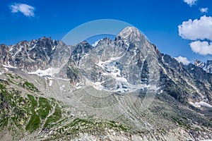 The Aiguille du Moine (l) and the Grande Rocheuse (c) in the french alps above Chamonix photo