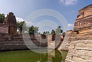 Chakra Gudi temple and its tank at water level  Aihole  Karnataka  India