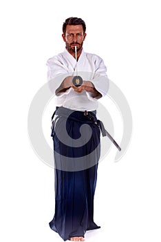 Aikido master pointing thw sword