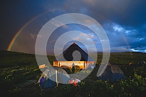 Ail the traditional altai house and tourist tents around under the rainbow dome