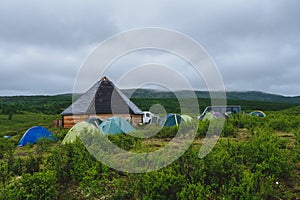 Ail traditional Altaic houses and tourist tents around