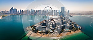 Ain Dubai ferris wheel on Bluewaters island with amazing Dubai skyline in the UAE photo