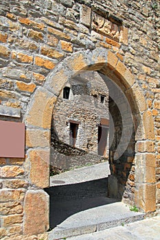 Ainsa medieval romanesque village arch fort door photo