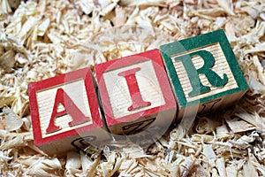 AIR assumed interest rate on wooden block photo