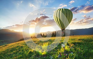 Air ballon above mountains at the summer time.