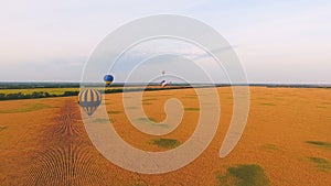 Air balloons flying over wheat fields, national amenities of nature, patriotism