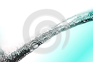 Air bubbles in blue water