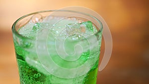 Air Bubbles And Foaming In Sparkling Green Water