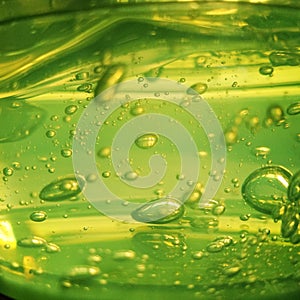 Background, walpaper, texture, abstrac the air bubbles in the water glow and are green with a jelly texture