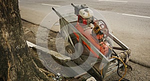 Air compressor in a cart usually used to patch a tire photo taken in Semarang Indonesia