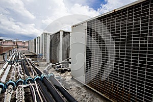 Air compressors on roof of factory