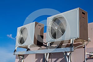 Air compressors on roof of factory