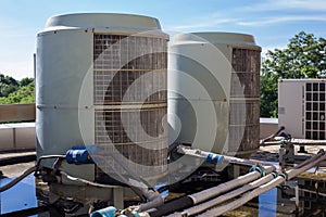 Air compressors on roof of factory