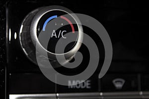 air condition button inside a car AC system