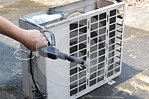 Air condition cleaning concept. Technician cleanning air service and maintenance. Air condition Cleanning with Professional