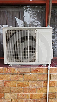 air conditioner component that is installed indoors and outdoors