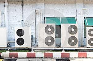 Air conditioner compressor installed old building.