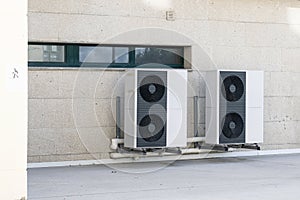 Air conditioner compressor units installed outside
