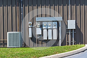 Air Conditioner and Electric Meters Outside an Office Complex