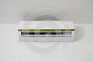 Air conditioner mounted on a white wall in the living room or bedroom. Indooor comfort temperature. Health concepts and