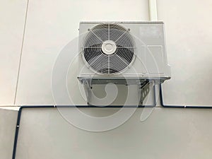 Air conditioner outdoor unit or heat Pump Compressor or Condenser Fan for support Air Conditioner in home .