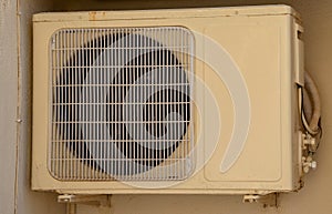 Air conditioner unit compressor outside a home. Condenser Fan for support residential cooling system. conditioning equipment