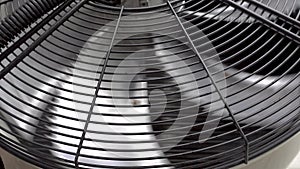 Air conditioner unit fan rotating. Close-up. 4K.