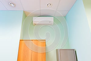 Air conditioner on wall background.